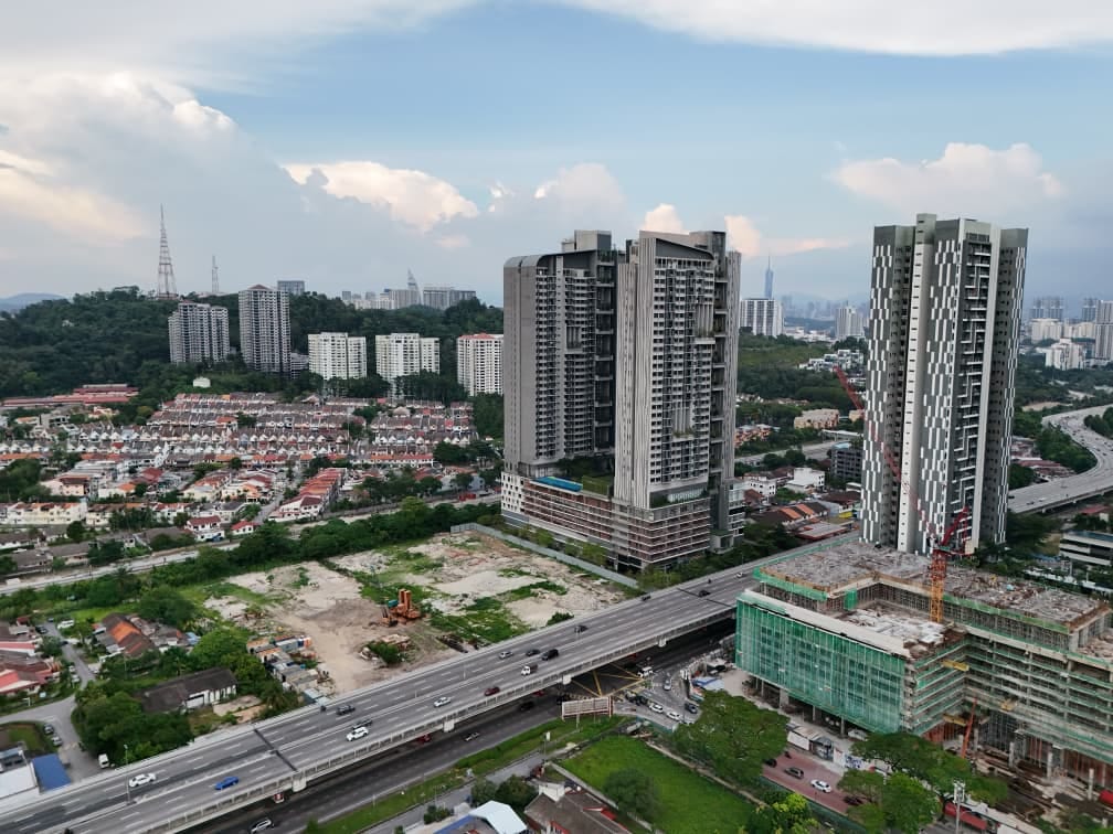 Old Klang Road cityscape aerial looking toward KLCC and KL Tower